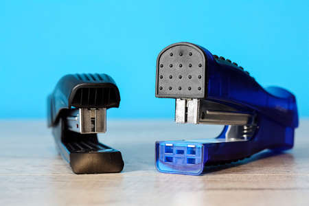 Stapler for office work on the table. Stationery item.