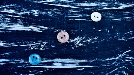 Buttons for clothing and sewing on the table. Decorative items oの写真素材