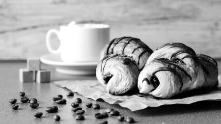 Fresh croissants with chocolate on the table. Delicious Breakfasの写真素材