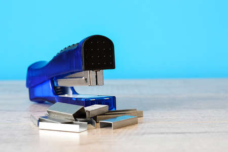 Stapler for office work on the table. Stationery item. Office suの写真素材