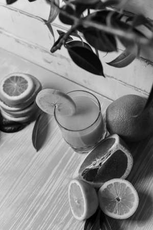 orange lying on a wooden tableの写真素材