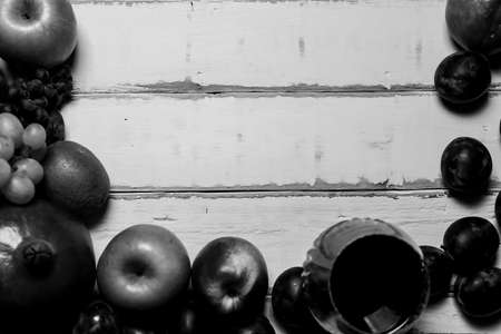 Fruit and wine on the tableの写真素材