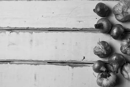 Garlic lying on the table. Food in the house. Medication againstの写真素材