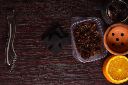 Hookah accessories on the table. Smoking Shisha. Relaxing enviro