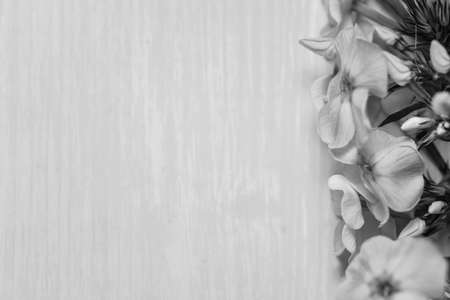 Flowers on a wooden tableの写真素材