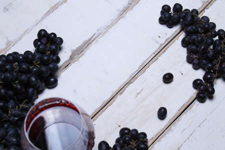 Wine and fruit on the tableの写真素材