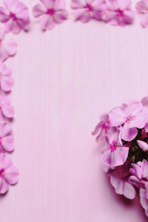 Frame of flowers on the tableの写真素材