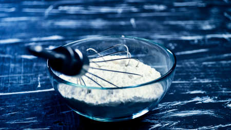 Flour and whisk for cooking food and cooking for women. Womens