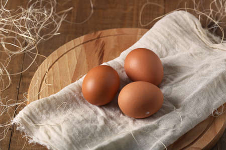 Eggs in the village on the table. The farms products.の写真素材