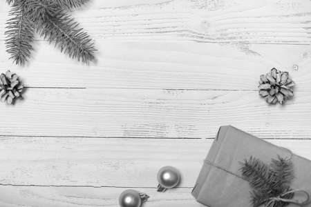 Christmas tree and objects on a white wooden backgroundの写真素材