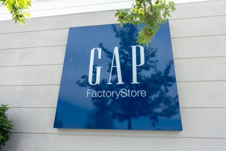 July 27 2022- Gap Factory Store Logo in McArthur Glen Outlet Shopping Centre Richmond, BC Canadaのeditorial素材