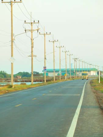 Stock Photo- hight voltage construction on roadの写真素材