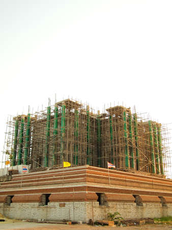 Stock Photo - Thai Pagoda is under construction in the rural templeの写真素材