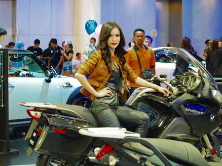 BANGKOK,THAILAND-APRIL 7 : Unidentified People in Motor Show 2013 Concept Of Street of Automotive Fashion on APRIL 7,2013 in BANGKOK,THAILAND.のeditorial素材