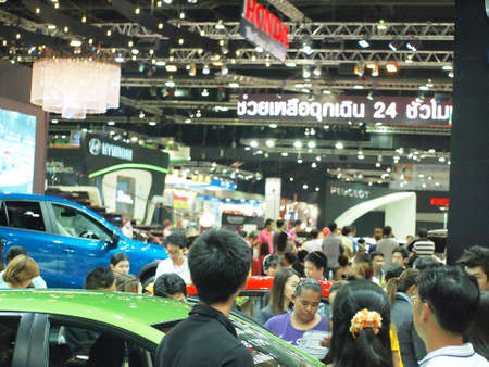 BANGKOK,THAILAND-APRIL 7 : Unidentified People in Motor Show 2013 Concept Of Street of Automotive Fashion on APRIL 7,2013 in BANGKOK,THAILAND.のeditorial素材