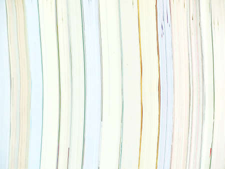 stack of different books on a white backgroundの写真素材