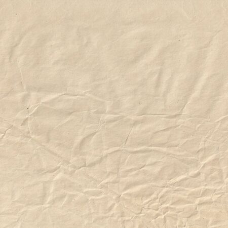 Crumpled paper sheet. Wrapping paper texture. Phototexture for your designの写真素材