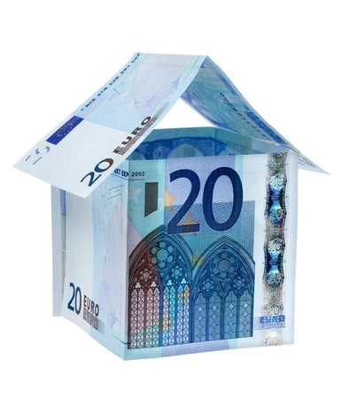 Three euro banknotes in the shape of a houseの写真素材