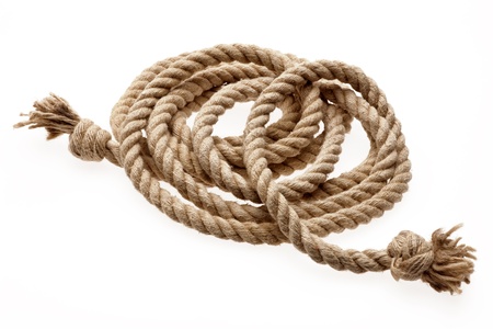 rope rolled up on a white backgroundの写真素材