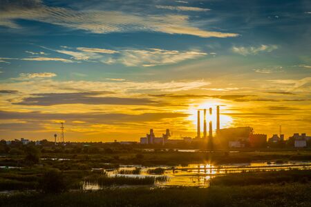 Power plant silhouette in sunset.の写真素材
