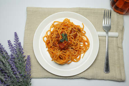 spaghetti on white plateの写真素材