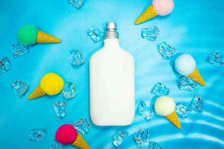 White pump perfume container on blue background