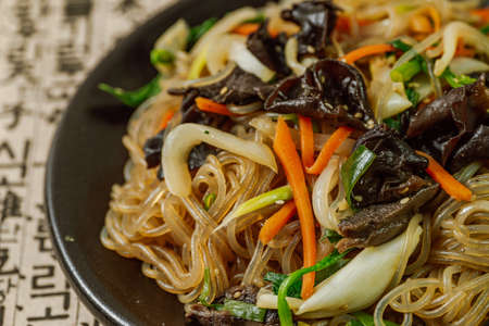Japchae, Korean Style Stir-fried Glass Noodles and Vegetablesの写真素材