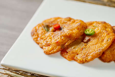 kimchijeon, Korean food kimchi pancake : Slices of well-fermented kimchi mixed into a flour batter...