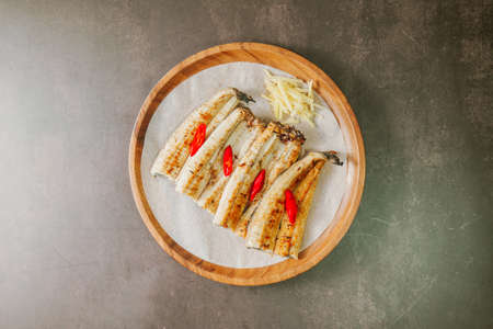 jangeogui, Cleaned eel are seasoned with salt, soy sauce, gochujang, and others to taste, and then grilled. Eel is rich in vitamins A, B, and C, which fight aging and keep the skin healthy and youthful.の写真素材