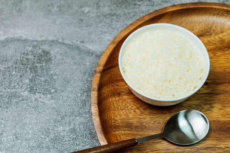 Delicious rice in a white bowlの写真素材