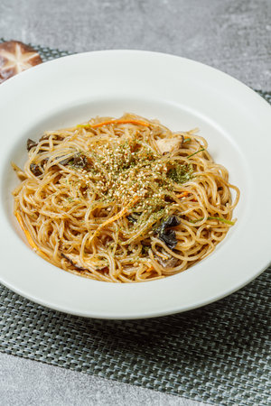 Japchae, Korean Style Stir-fried Glass Noodles and Vegetablesの写真素材