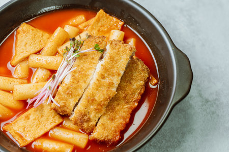 Tteokbokki, Stir-fried Rice Cake : Sliced rice cake bar (garaetteok) or thin rice cake sticks (Tteokbokkitteok) stir-fried in a spicy gochujang sauce with vegetables and fish cakes.の写真素材
