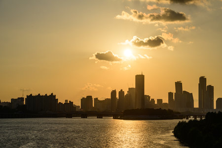 The night view of the city of Yeouido, a high-rise building, shot at Dongjak Bridge in Seoul at sunsetの写真素材
