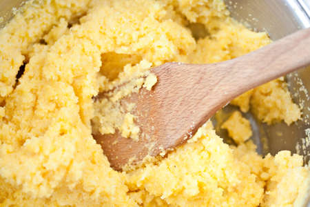 polenta corn traditional food cooking in dishの写真素材