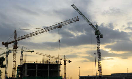 construction crane and sunsetの写真素材