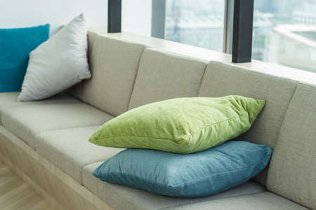 Decorative pillow on sofaの写真素材