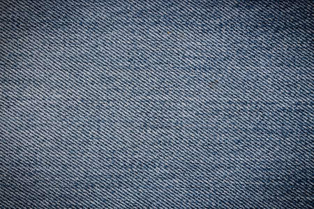 closeup blue jean texture may use as backgroundの写真素材