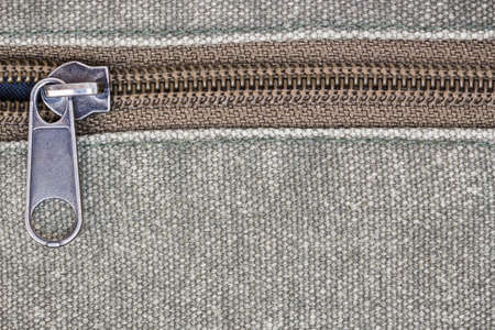 close up zipper on fabric textureの写真素材