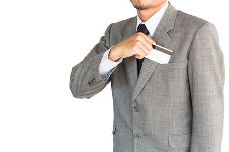 business man hold credit card isolated white backgroundの写真素材