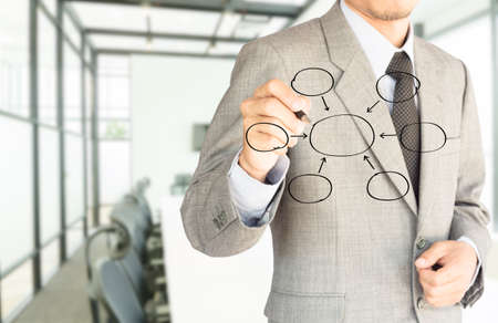 strategy business man drawing text bank and office interior backgroundの写真素材