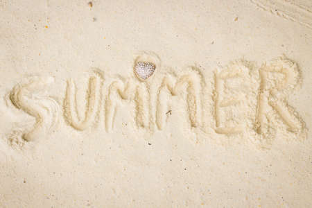 text love summer on white sand beachの写真素材