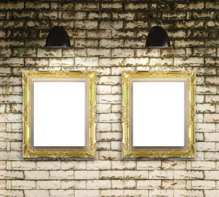 exhibition photo gallery picture frame on brick wall background and lamp showの写真素材