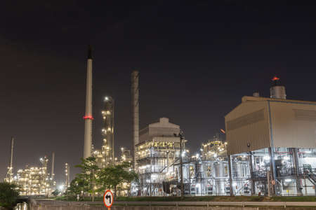 oil refinery plant factory at nightの写真素材
