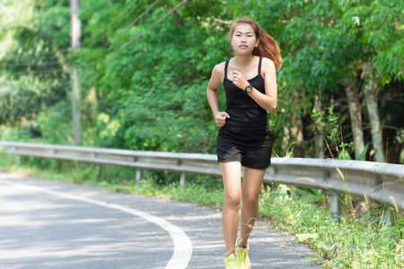 activity beauty women runing in morningの写真素材