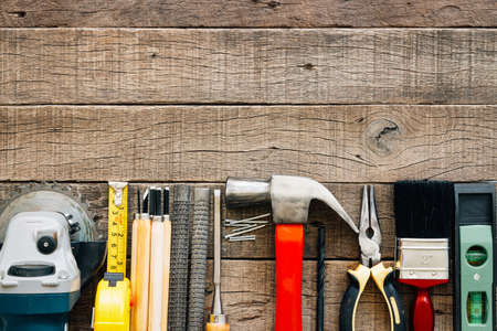 carpentry tools equipment on grain wood on top viewの写真素材