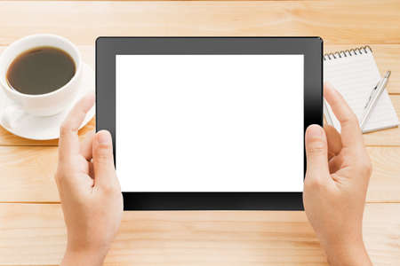 close up hand using tablet white screen displayの写真素材
