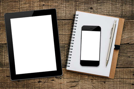 tablet and smartphone on wood backgroundの写真素材