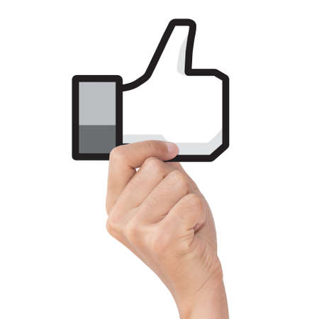 hand holding like icon on white with clipping pathの写真素材