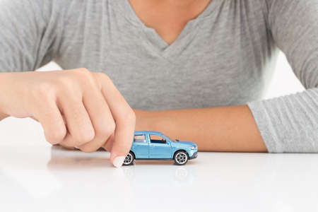 women holding model car leasing business conceptの写真素材