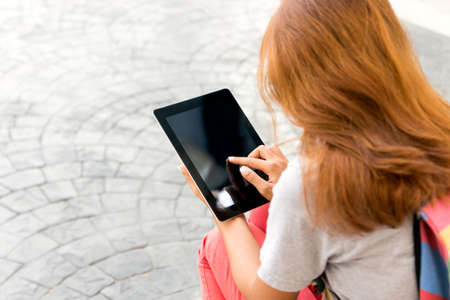 woman using tablet find information in internetの写真素材